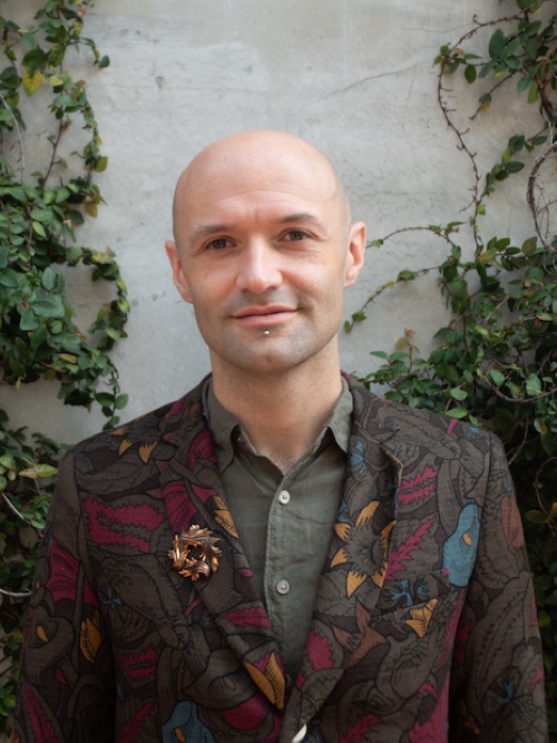 Headshot image of composer and artist Clovis McEvoy.